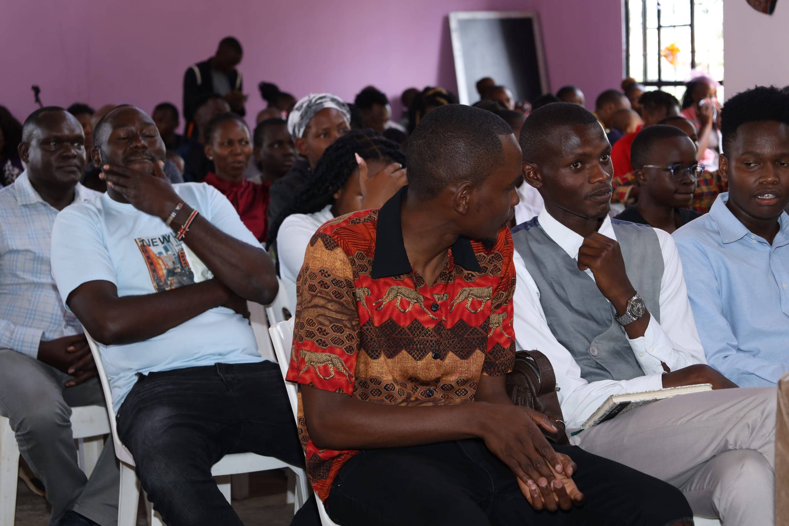 Members of the church family together